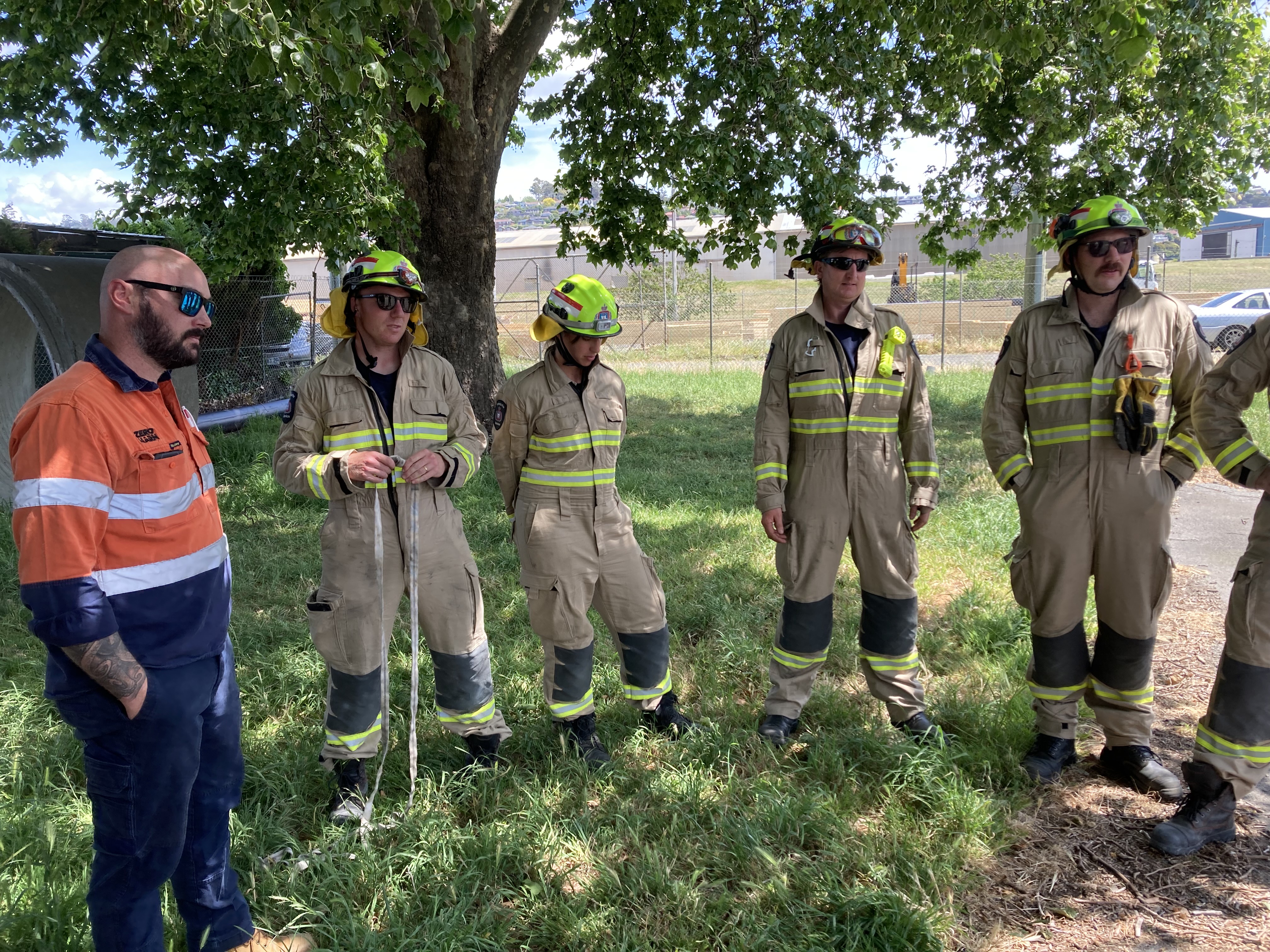 Crew getting their briefing next to tree at Launceston Water Pump for TasFire Training Nov 2023 
